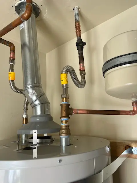 Water heater installation and plumbing repair in Lower